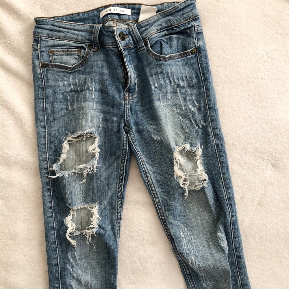 Women’s distressed denim jeans